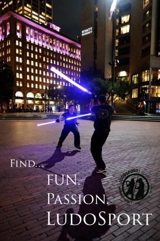 LudoSport Image of two people fighting with purple lightsabers